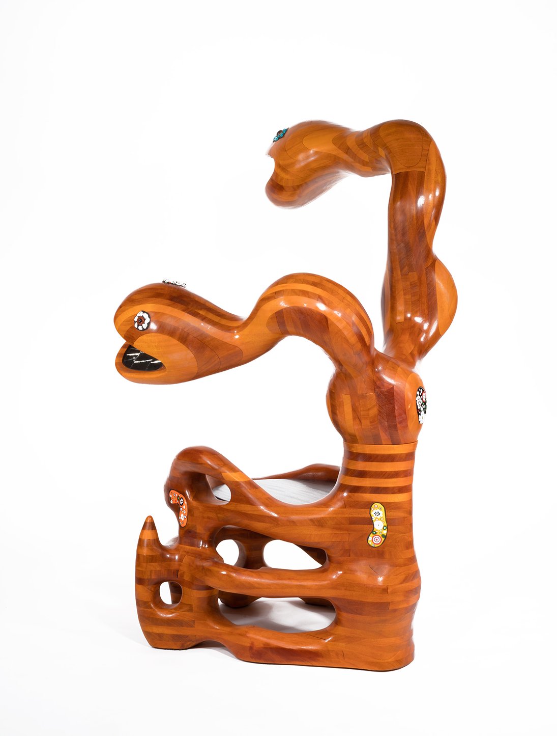 Niki de Saint Phalle (1930- 2002), Double Headed Snake Chair, 1999. Painted wood, ceramic and mirror inlays. Photo © Patrick Goetelen Niki de Saint Phalle_Double-Headed Snake Chair_LR.png